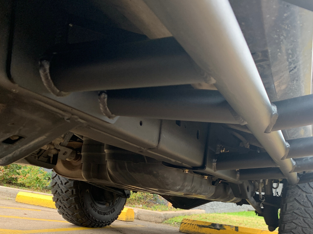 Close up underside view of 4Runner with Trail Edition bolt on rock sliders - Cali Raised LED