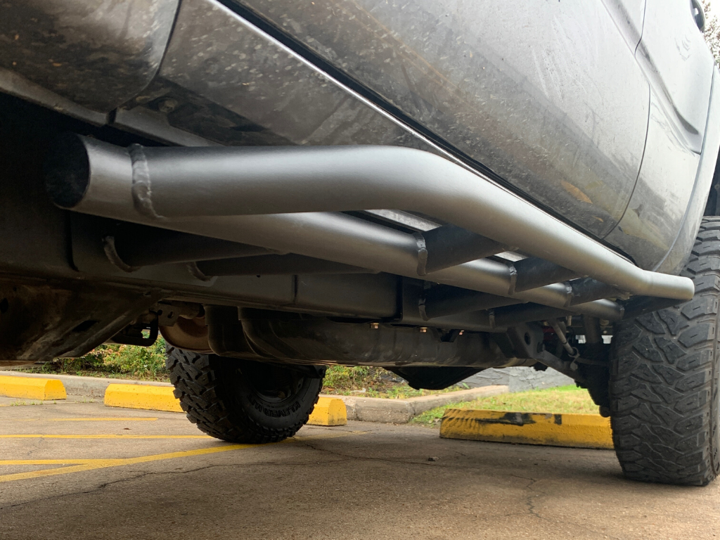 Close up underside view of 4Runner with Trail Edition bolt on rock sliders - Cali Raised LED