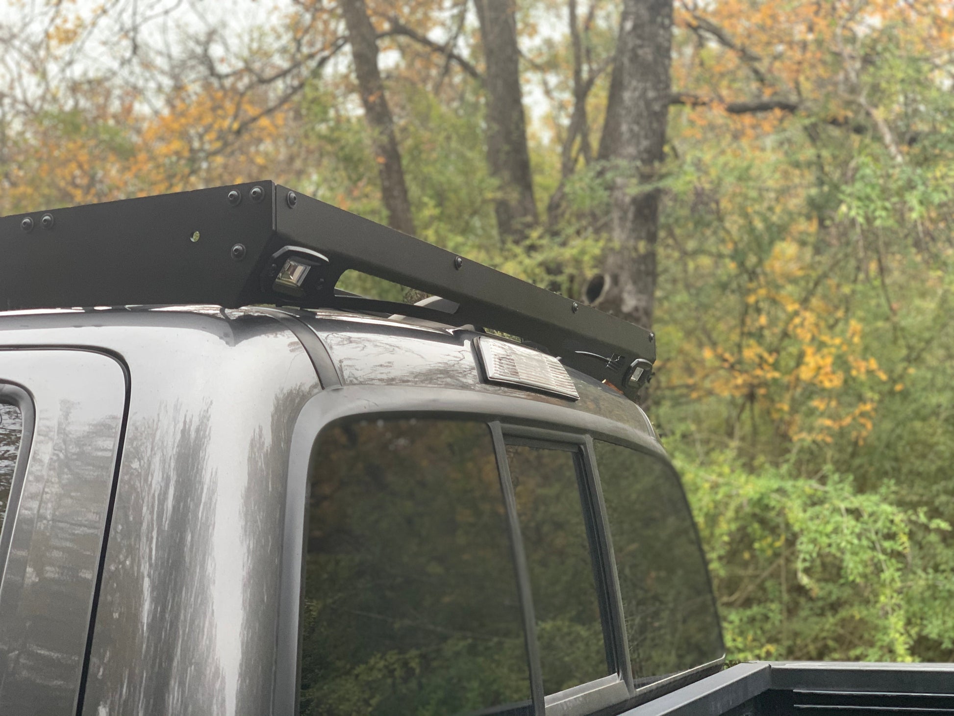 Rear view of gray Toyota Tacoma with Premium Roof Rack - Cali Raised LED