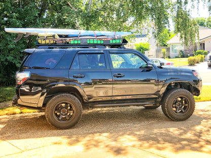 Passenger side - Trail Edition Bolt On Rock Sliders installed on black 4Runner - Cali Raised LED